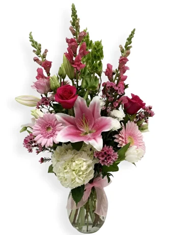 Introducing our Colors of Compassion, a flower arrangement that suits anyone. Give a gift that shows how much you care, and it will be delivered quickly today! Whether your recipient is at work, home, school, a hospital, retirement/assisted living facility, hospital, or a church/funeral service- Country Charm Floral & Gifts will hand deliver 7 days a week to any address within New Carlisle or LaPorte County, IN.