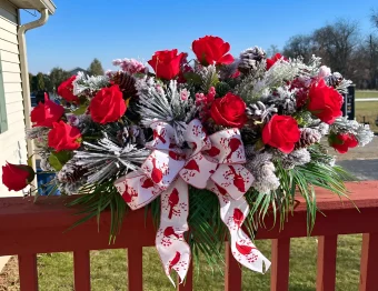 Winter Roses Saddle | Beautiful Red Roses and Snowy Pine Cemetery Saddle Arrangement | Buy Fresh and Artificial Flower Arrangements directly from your Local Florist in Rolling Prairie, IN Country Charm Floral and Gifts | Available for Local Delivery 7 Days a Week | New Carlisle & LaPorte, IN |