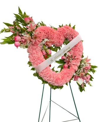 Open Heart Funeral Wreath | Large, Beautiful, and Extravagant Pink Floral Heart Shaped Wreath | A Beautiful Display During Funeral & Memorial Services, Especially for a Mother, Grandmother, Sister, or any Special Women You Want to Pay Tribute To | Local Professional Florist for all Funeral Arrangements, Providing Delivery 7 Days a Week to New Carlisle, Michigan City, and LaPorte County, IN.