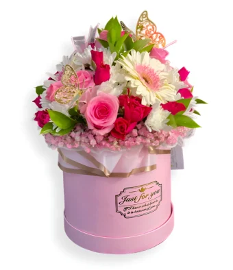 Barbie Pink Gift Box: An Elegant and Classy Valentine's Day Flower Arrangement that will Leave Your Loved One Speechless. A Round Gift Box Filled with the Freshest Pink Roses, Gerbera Daisies, Chrysanthemums, and Pink Baby's-Breath, Made Especially for Your True Love. PreOrder for Valentine's Day and You Will Receive FREE Local Delivery to LaPorte County, IN.
