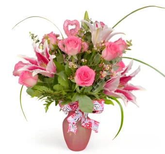 Pink Roses and Lilies Hand Delivered to your Sweetheart this Valentine's Day 2024. Choose a Bouquet She will Love with our Unique Selection of Valentine's Day Arrangements, and add some Chocolates, Teddy Bears, and Balloons to make it Perfect! Your Local Florist Shop Delivering to all addresses throughout LaPorte County and New Carlisle, IN. Country Charm Floral and Gifts, Rolling Prairie, IN.