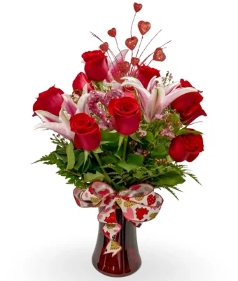 Romantic Reds - A Delightfully Romantic Combination of Red Roses and Lilies, Perfect for treating your Love this Valentine's Day 2024. With a Dozen Red Roses and Lily Stargazers, You will surely deliver the most Romantic Surprise of Flowers! All Valentine's Day Flowers, Gifts, Chocolates, and Bears are Delivered Quickly and Reliably by your Local Florist Shop Country Charm Floral and Gifts. Delivering to all addresses in LaPorte County and New Carlisle, IN.