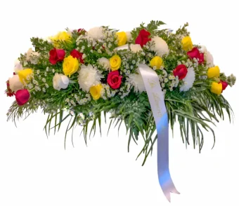 In Loving Memory Casket Spray - Masculine and elegant, this makes a perfect display during a funeral service or wake. Masculine Funeral Fowers are ver fitting for the loss of a Father, Brother, Grandfather, Son, or any man you love so dearly. Arranged with the freshest flowers at Country Charm Floral and Gifts, this arrangement is delivered directly to funeral homes and churches for funeral services, memorials, and wakes, Same day & Next day delivery available throughout LaPorte County and New Carlisle, IN and New Buffalo, MI.