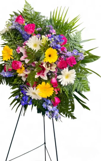 Celebration of Life Spray | Gorgeous and Vibrant Fresh Flower Standing Spray for Funeral Services and Celebration of Life. Delivery throughout LaPorte County, IN 7 Days a Week directly to funeral homes and churches. Country Charm Floral and Gifts, your local funeral florist, or florist for any occasion.