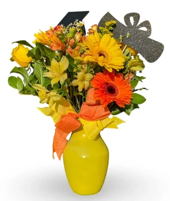 Graduation Bouquet | Celebrate a High School or College Graduate with our Freshest Flower Arrangements, Decorated with a graduation cap and diploma. Local Delivery Provided 7 Days a Week throughout LaPorte County, IN. Family Owned, Reliable Florist in Rolling Prairie, IN Country Charm Floral and Gifts.