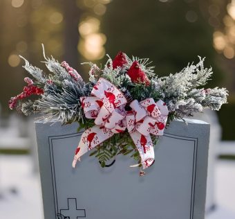 Our Snowy Cardinal Saddle is handmade with high quality artificial snowy pine and decorated beautifully with meaningful and symbolic Cardinals. We've specifically designed this Cemetery Saddle Arrangement to bring Festive Holiday Cheer, and add a Meaningful, Heartwarming Display to a Loved One's Gravesite. LaPorte, Indiana Local Florist, Best Choice for Sending Flowers for Every Occasion- 7 Days a Week.