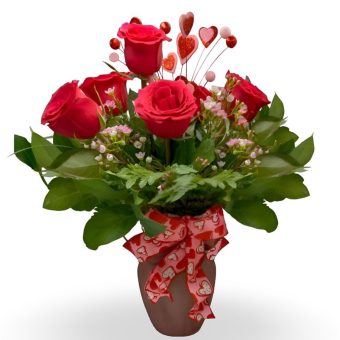Half Dozen Roses | Premium, Fresh-Cut Red Roses Arranged with flirty heart picks and heart ribbon in a glass vase. This is a perfectly romantic 6 Rose Bouquet that will surely make your Valentine's Day the best yet! Order the freshest flowers and best quality arrangements this Valentine's Day from Country Charm Floral and Gifts for Fast, Reliable Delivery to LaPorte, Indiana areas.