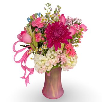 Our stunning Pink Petals Bouquet is a radiant and heartwarming fresh flower arrangement that suits any occasion. A lovely large glass vase filled with luscious, vibrant pink Roses, Gerbera Daisies, Lilies, Carnations, Mums, Hydrangea, and Hypericum Berries paired with various seasonal flowers with a touch of fresh greenery. LaPorte, Indiana Flower Delivery 7 Days a Week.