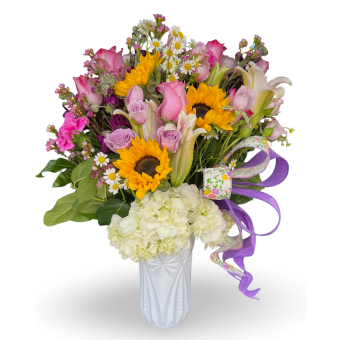 Sweet Sunflower Surprise: A gorgeous statement piece for any room, this bouquet of fresh-cut Sunflowers, Roses, Lilies, and Daisies in a tasteful white vase will surely make anyone's day a bit sweeter. Send your mom or spouse a Sweet Sunflower Surprise- Perfect for a Mother's Day or Birthday Gift of the freshest flowers. This Fresh Bouquet of Blooming Vibrant Sunflowers is a perfectly sweet bouquet to Send for Any Occasion such as Birthday, Anniversary, Sympathy, and More | LaPorte, Indiana Delivery 7 Days a Week.