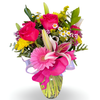 Pretty in Pink Bouquet: A Best-Selling Birthday Bouquet | Send Our Vibrant, Fresh, Pink Flower Arrangement to Someone Special to Celebrate an Anniversary or Birthday. Hot Pink and Light Pink Roses, Lilies, Gerbera Daisies, Carnations, and Eucalyptus in Glass Vase | Fast Local Delivery to LaPorte & New Carlisle, IN.