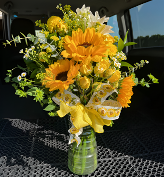 A Sunflower Seasonal Mix Bouquet We Call Our Sunny-Side-Up Bouquet is arranged with Sunflowers and yellow Roses with beautiful accent flowers and greenery- the perfect flower arrangement to bring a little sunshine to someone's life! Your Local Florist Small Business Country Charm Floral and Gifts in Rolling Prairie, IN delivers flowers 7 days a week!